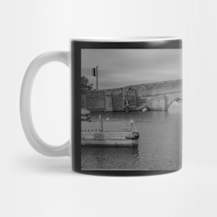 Stone bridge over the River Thurne in the village of Potter Heigham Mug